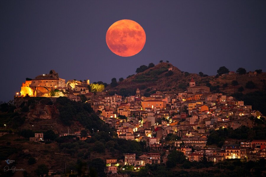 Today's NASA image, the moon over Sicily!